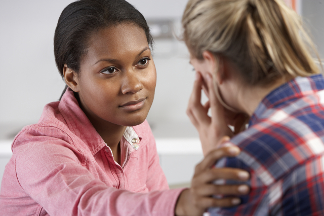 Photo of a therapist counselling a woman