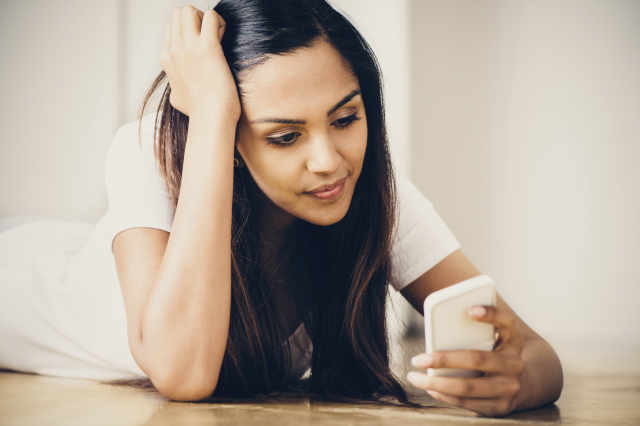 Photo of a woman on her cell phone